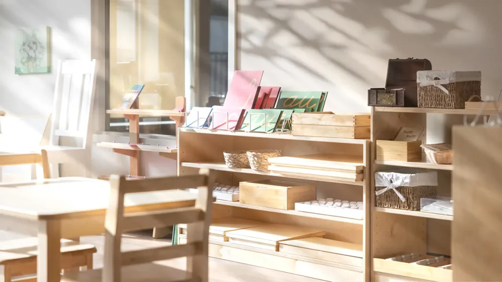 Guidepost Montessori classroom with wooden shelves, hands-on learning materials, and natural light